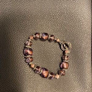 Vintage bracelet with purple/lavender beads and silver toned embellishments